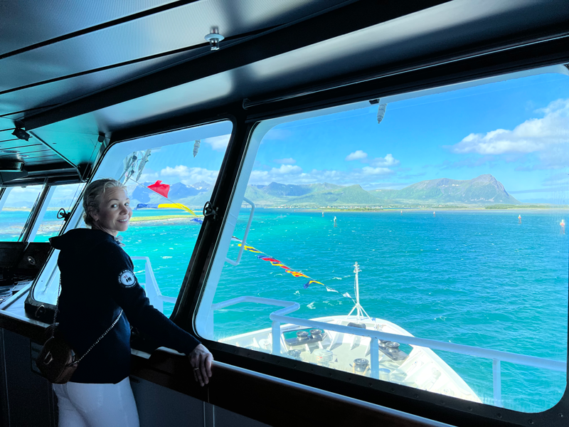 Hedda Felin on board MS Richard With looking out to Raftsundet in Norway.